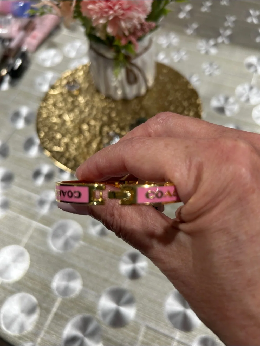 043. Pink Enamel and Gold Logo Bracelet With Box 6 3/4”